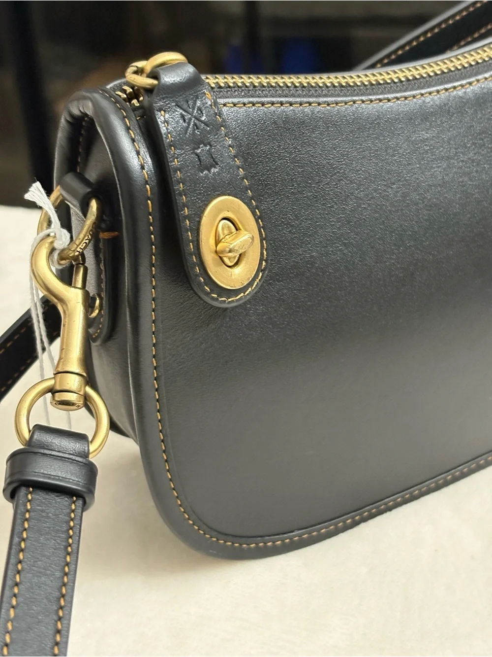 Coach Black Swinger Glove-Tanned Leather Crossbody Bag.